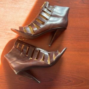 Gently used upper leather heals gladiator style Michael Kors size 10